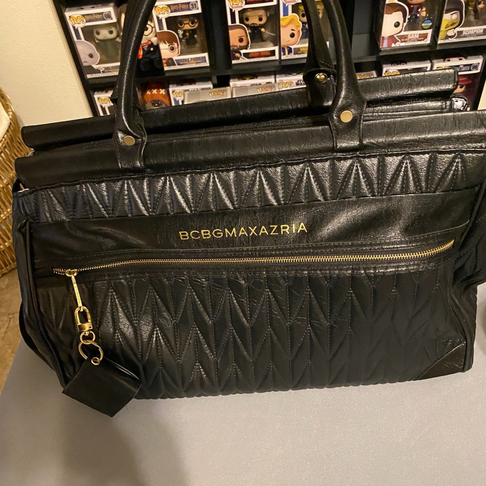 BCBGMaxAzria Black Quilted Travel Bag with Gold Accents